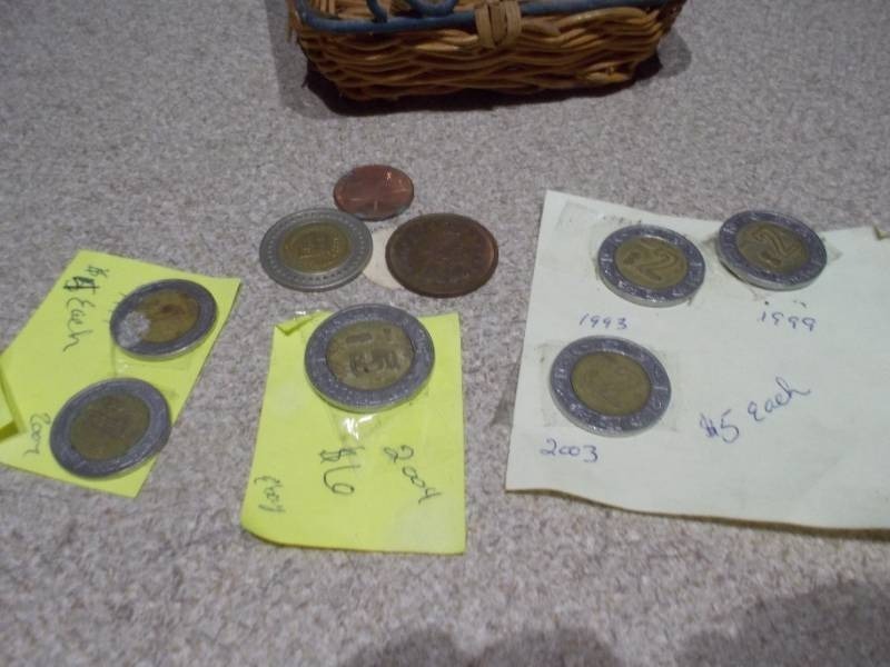 lot 101 image: These are Mexican peso coins, specifically a collection of various denominations and years