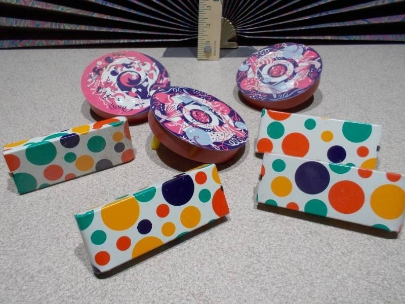 lot 108 image: These are vintage metal tin New Years Eve party noisemakers, likely from the 1950s or 1960s.