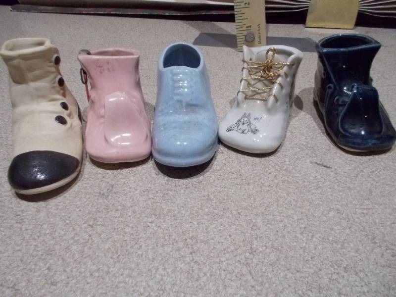 lot 141 image: These items are vintage ceramic baby shoe planters