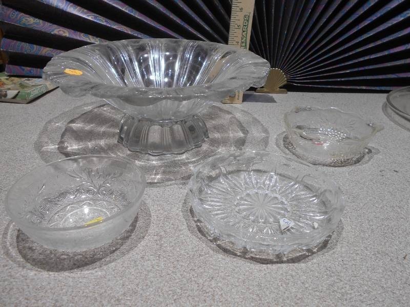 lot 157 image: The image features a collection of vintage pressed glass bowls