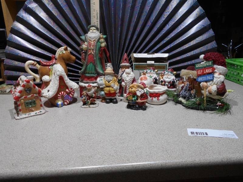 lot 159 image: This is a lot of assorted Santa Claus figurines
