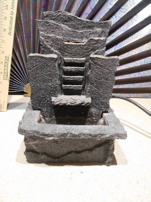 lot 183 image: a small tabletop rock water fountain