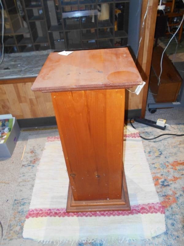 lot 187 image: This is a wood pedestal or plant stand