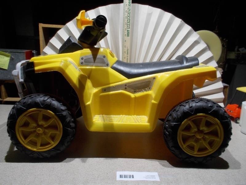 lot 264 image: This item is a Kid Trax CAT Tough Toddler Quad.