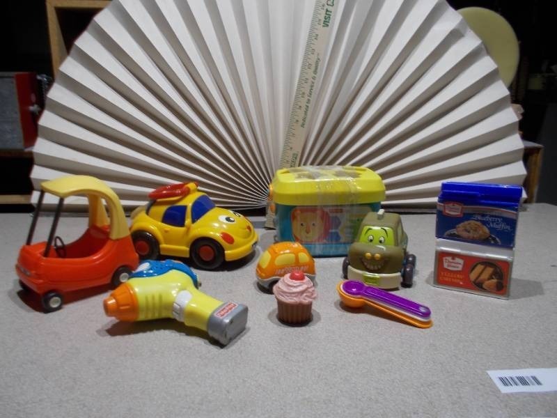 lot 273 image: This image features a collection of assorted small plastic toys