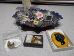 Glass Bowl full of Vintage Jewelry and Bakelite cameo pin