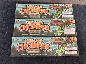 lot 31 image: 3 Dinobros Dinosaur Chompers With Sound