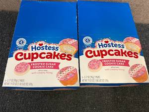 lot 160 image: 2 Packs Of Hostess Frosted Sugar Cookie Cupcakes