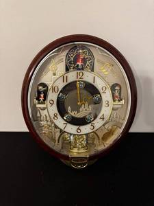 lot A-59 image: Seiko OXM160BRH Disney Musical Clock - Castle Dial, Moving Figures, Wall Clock