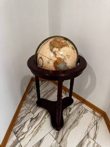 lot 85 image: World Globe on Dark Mahogany Pedestal Stand - 12-Inch Globe Diameter