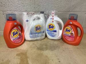 lot 215 image: LOT OF 4 Tide Laundry Detergent (Tide Downy- 69 Fl Oz, Tide Free & Gentle- 105 Fl Oz, 132 Fl Oz)