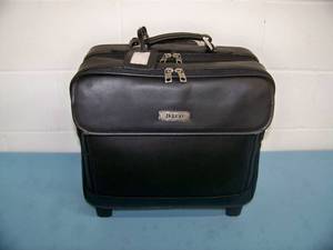 lot 44 image: Black Leather Travel  Equipment Bag with Multiple Compartments, Telescoping Handle and Wheels