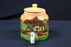 lot 16 image: Hand-Painted Ceramic Spigot Jar with Lid - Tropical Village Scene