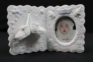 lot 44 image: Porcelain Baby Photo Frame with Hanging Booties - 2x3 Opening, White