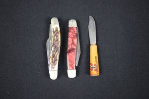 lot 93 image: Three-Piece Folding Pocket Knife Set - Inlaid Handles