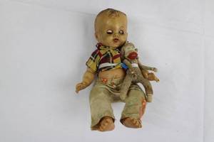 lot 105 image: Vintage Composition Baby Doll - Plaid Shirt & Rag Monkey