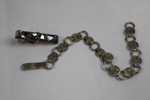 lot 137 image: Vintage Japan-Made Silver-Tone Chain Bracelet with Black Faceted Bar Centerpiece
