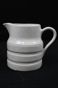 lot 178 image: Creamer - White Ceramic with Stacked Ring Base