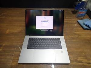 lot 43 image: 2021 Apple MacBook Pro A2485 &nbspApple M1 Pro 10 core CPU  32GB DDR4 RAM  1TB SSD  Includes IOS  No power adapter  Unit is in good cosmetic condition