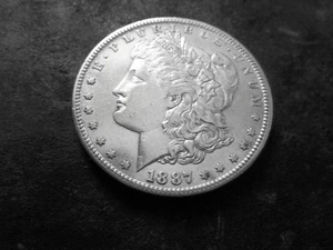 lot 17 image: 1887 S Morgan Silver Dollar
