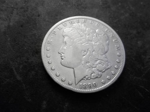 lot 23 image: 1890 CC Morgan Silver Dollar