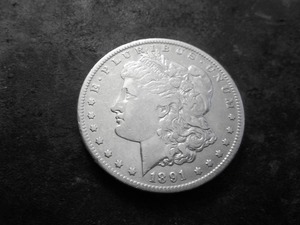lot 24 image: 1891 CC Morgan Silver Dollar