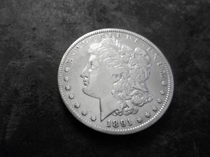 lot 25 image: 1891 O Morgan Silver Dollar