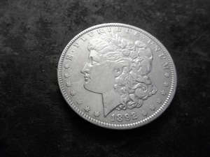 lot 29 image: 1892 O Morgan Silver Dollar