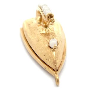lot 48 image: Estate Seed Pearl Mini Iron PendantCharm in 14k Yellow Gold VIDEO