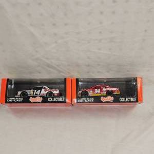 lot 5 image: (2) 143rd Scale Nascar Quartzo Collectible