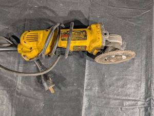 lot 40 image: DEWALT D28402 4-12 in. Angle Grinder - 120V AC