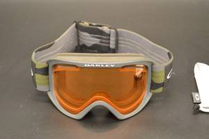lot 67 image: Oakley Snow Goggles - Camouflage Strap, Orange Lens, Gray Frame