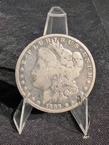 lot 87 image: 1889-O Morgan Silver Dollar.