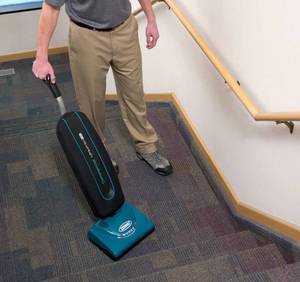 lot 7 image: MSRP $2,200  Tennant Nobles V-LWU-13B Commercial Cordless Lightweight Upright Vacuum, 44V Lithium-Ion Battery Powered, High Performance Floor Cleaning, Works Excellent Battery Still Charged - Missing Charger Cord Buy Online - See Description For Links
