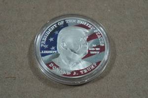 lot 199 image: President Donald J Trump Colorized Coin - 1.75