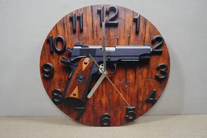lot 204 image: Colt 45 Pistol 10 Clock