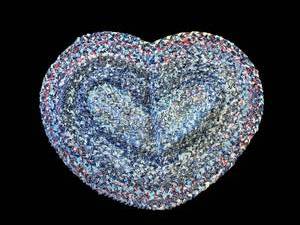 lot 91 image: Decorative Heart Shaped Braided Rug