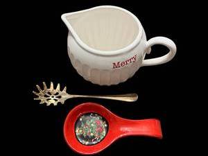lot 129 image: Creamer Merry White Ceramic - Red Holiday Spoon Rest & Silver Ornate Spoon (3-Piece Set)