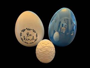 lot 150 image: Be Kind Decorative Egg Trio - Cream Egg with Script, Blue Reflective Egg, Textured White Egg