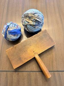lot 176 image: Vintage Wood-Handled Wool Brush and Two Fabric Balls