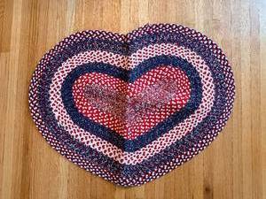 lot 260 image: Heart Shaped Braided Rug - 33x24 Inches