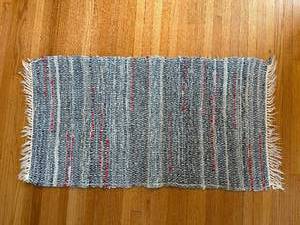 lot 270 image: Braided Rug 38x22 - Blue Denim with Red Accents
