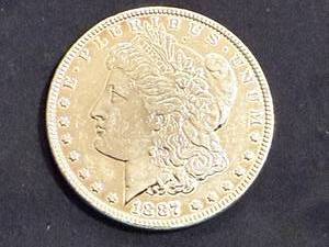 lot 5 image: 1887 Morgan Dollar - Cleaned