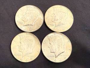 lot 38 image: 4 1969 Kennedy Half Dollars