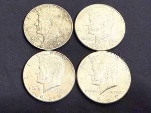 lot 39 image: 4 1969 Kennedy Half Dollars