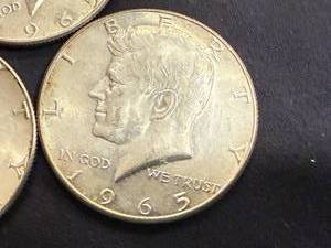 lot 40 image: 3 1965 Kennedy Half Dollars