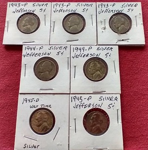lot 17 image: (7) Silver War Nickels
