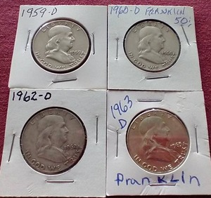 lot 38 image: (4) Franklin Half Dollars