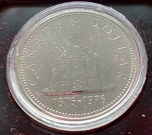 lot 45 image: 1976 Canada Parliamentary Library Silver Dollar