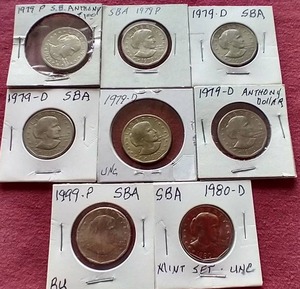lot 59 image: (8) Susan B Anthony Dollars